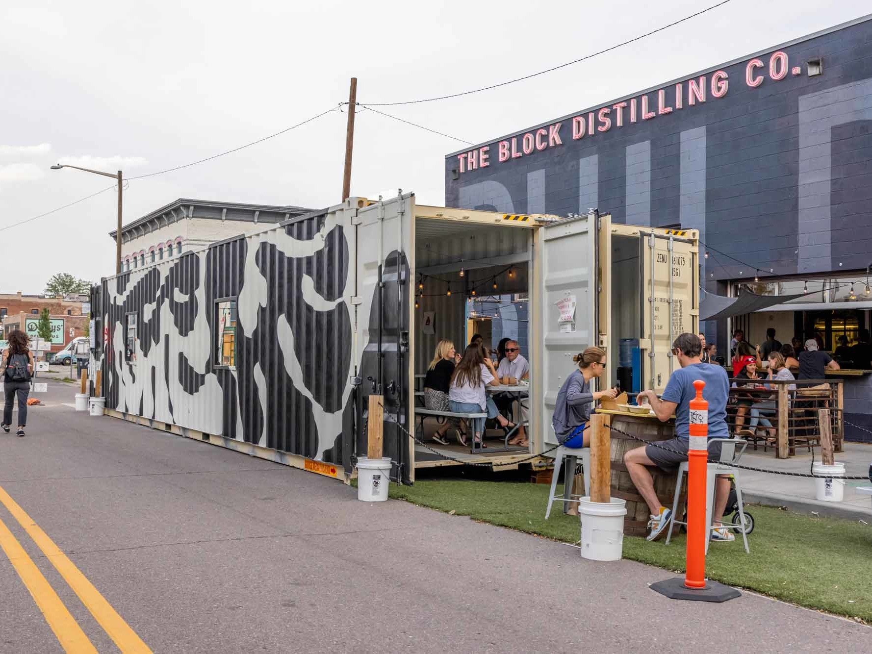 The Block Distilling Company custom shipping container patio seating area built by ROXBOX Containers.